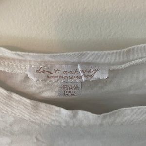 White cropped top with quarter length sleeves